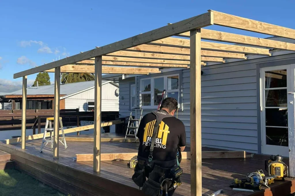 Skilled builder constructing custom decks with Deck Builders Palmerston North for quality outdoor living.