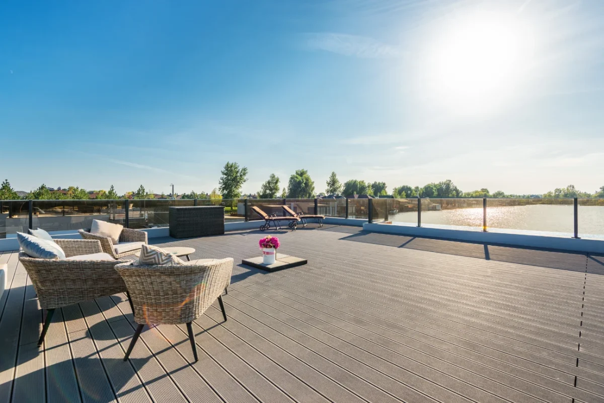 About us and outdoor living at Deck Builders Palmerston North Outdoor deck with chairs illustrates the about us passion of Deck Builders Palmerston North.